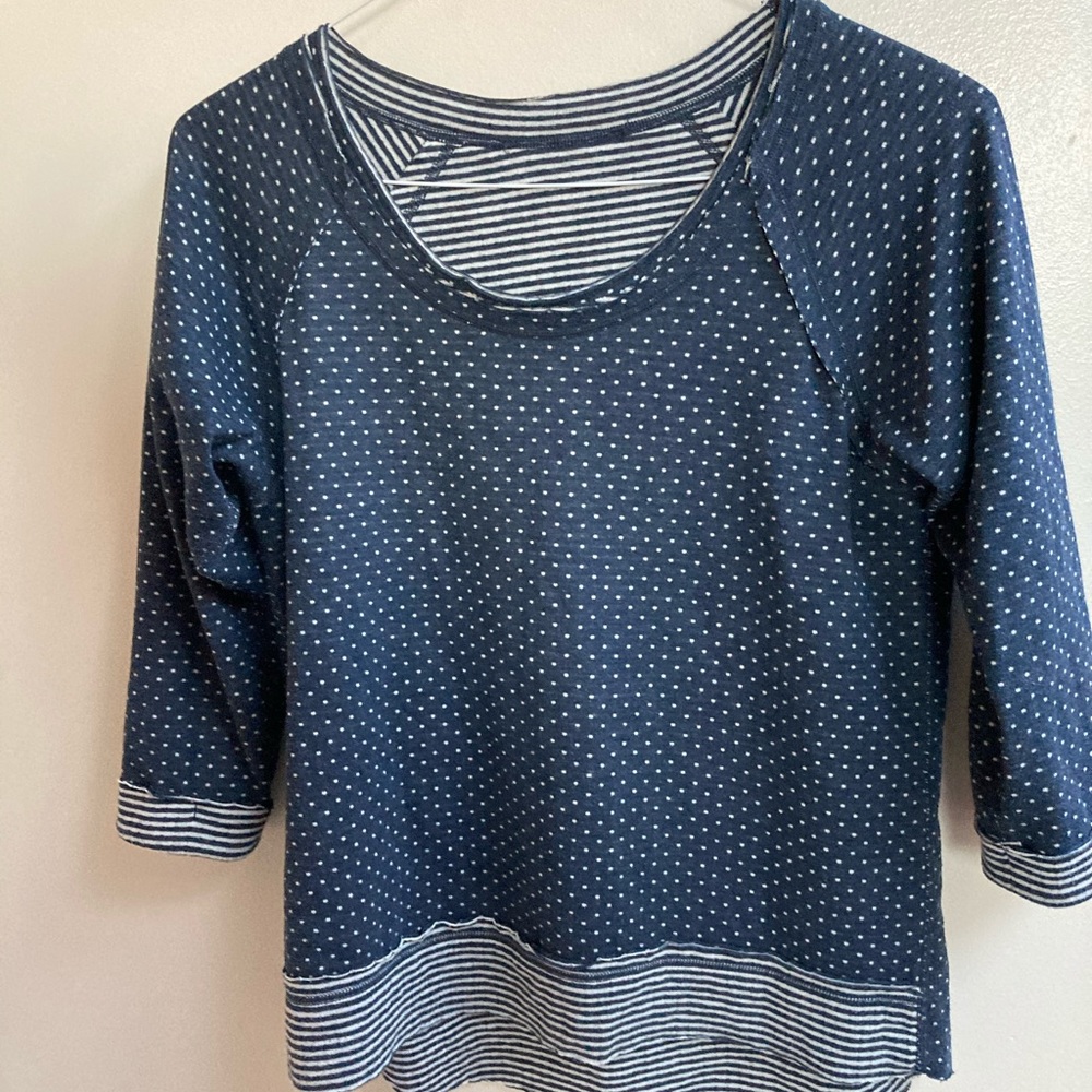 Top, light knit wear either polka dots or stripes